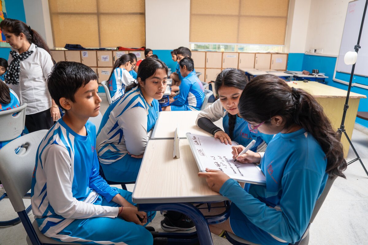 JBM students collaborating in class